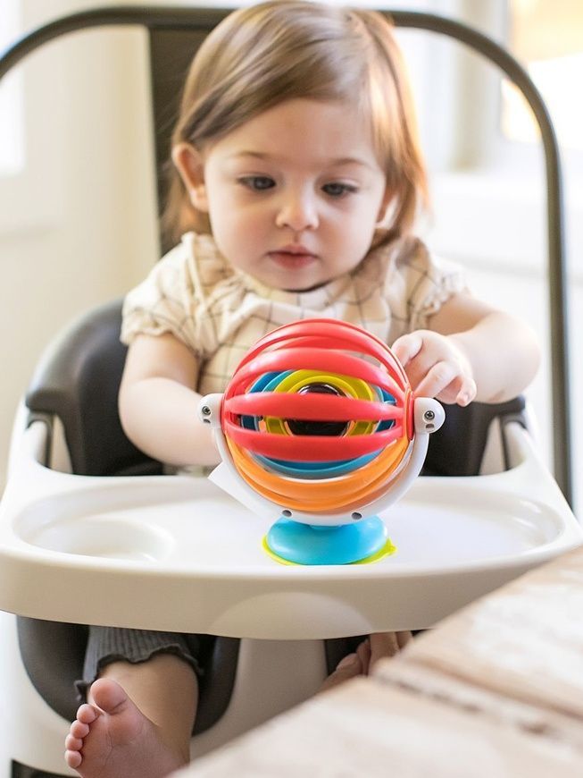 Іграшка дитяча на присосці Baby Einstein "Sticky Spinner" фото